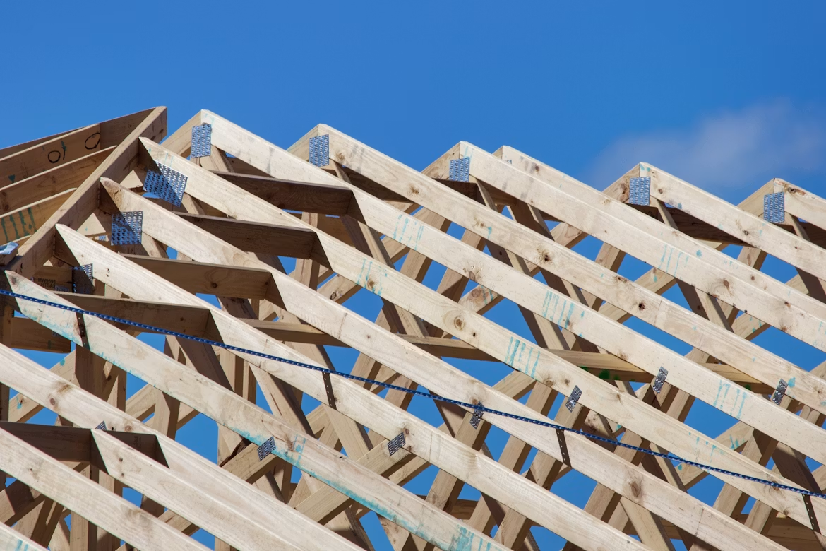 Timber roof trusses under construction — Strata Construction Group site work
